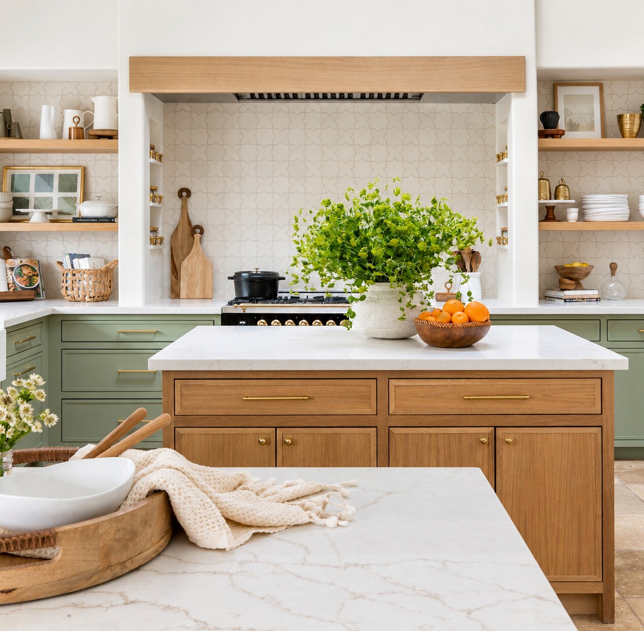 Kitchen with painted cabinetry and a natural wood island